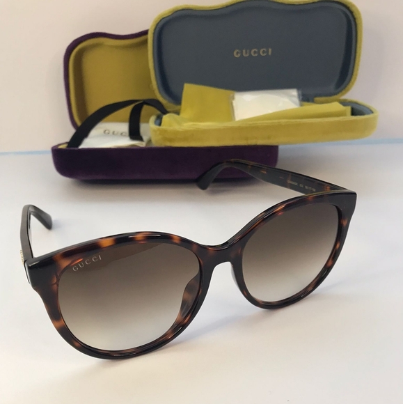 Auth - GUCCI GG0636SK 002 round Gucci sunglass comes in a dark havana frame with main image 15